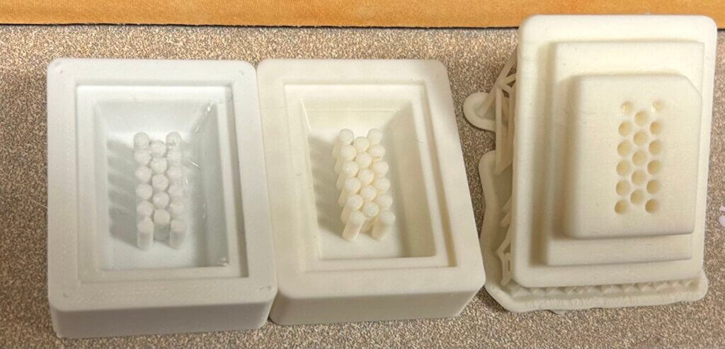 Three prototypes of the 17 hole tissue array mold prior to downsizing to 14 holes.